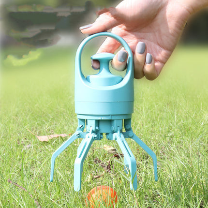 portatile pooper scooper per cani in uso su un prato verde, progettato per raccogliere rifiuti con facilità.